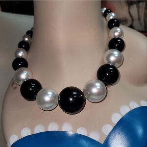 Retro 1940s costume jewelry necklace with oversized black & white faux pearls